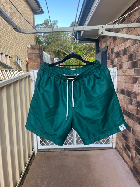 Dark green board shorts sale